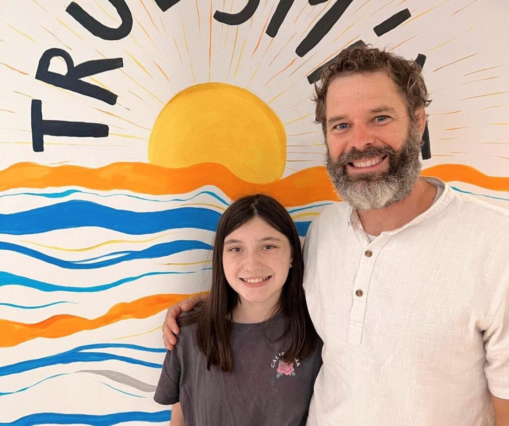 Dr. Christopher Trockel with a patient